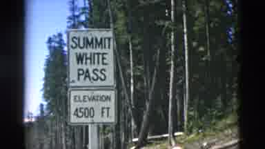 OREGON USA-: View Of Summit White Pass Sign And Snow Covered Mountain