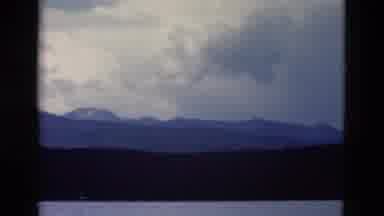 Yellowstone Wyoming USA (1958): First A Mountain Range Covered By Clouds Above And