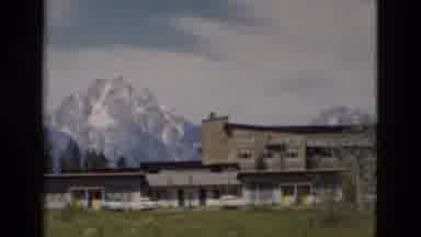 Yellowstone Wyoming USA (1958): A Building Is Situated In The Near Of The Mountain