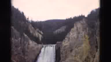 Yellowstone Wyoming USA (1958): Mountain Peaks Pine Trees A Waterfall And A Good
