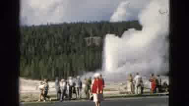 Yellowstone Wyoming USA (1958): Woman In 1950'S Walking Away From A Huge Erupting
