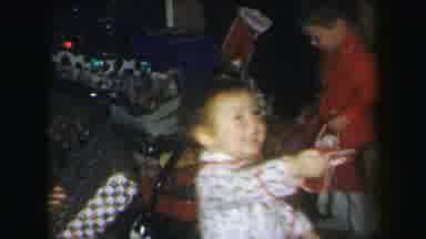 Lynbrook New York (1971): Girl Dressed In White Pajamas Offering Candy Christmas