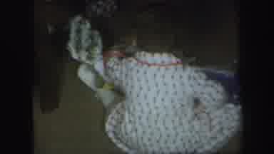 Lynbrook New York (1971): A Little Girl In Her Nightgown Opening A Christmas