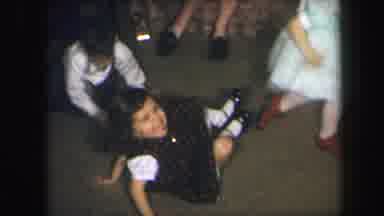 Lynbrook New York (1971): The Childrens Are Playing Ring Ring Roses On The House
