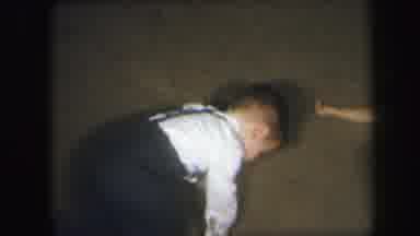 Lynbrook New York (1971): Children Crawling Around On The Ground And Playing