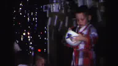 Lynbrook New York (1971): A Family Opens Presents Christmas Morning And One Little