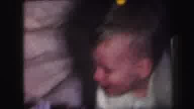 Lynbrook New York (1971): A Baby Dressed In White Crawls Through Discarded Gift