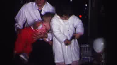 Lynbrook New York (1971): Man Wrangles Ansty Toddler