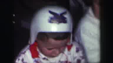 Lynbrook New York (1971): Kid With White Helmet With Blue Label Children Laughing