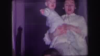 Lynbrook New York (1971): A Women Walking Down The Stairs With A Baby In Her Arms