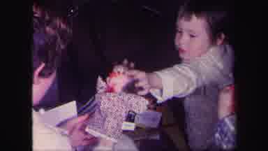 Lynbrook New York (1971): Young Boy Grabbing Chipmunk Toy Puppet From His Mother's