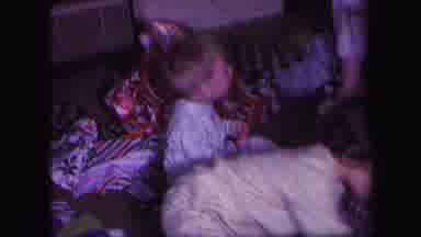 Lynbrook New York (1971): Children Opening Christmas Presents And Playing With Red