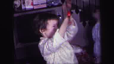 Lynbrook New York (1971): A Child Spinning A Ward Around In The Air Similar To