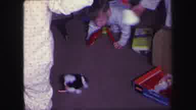 Lynbrook New York (1971): Kids In Pajamas Opening Presents And Playing With