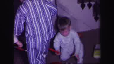 Lynbrook New York (1971): Three Boys Playing With Two Batons And A Wind Up Puppy