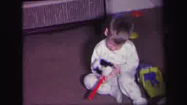 Lynbrook New York-1971: Young Boy And Girl Play On The Floor With Their Toys And