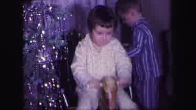 Lynbrook New York (1971): Children Wearing Blue And Yellow Pajamas Play With