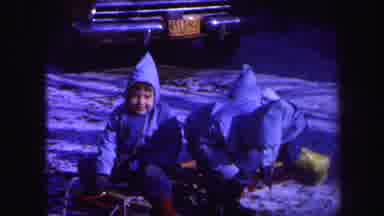Lynbrook New York (1971): Four Kids Wearing Blue Coats Play With Wooden Sled In