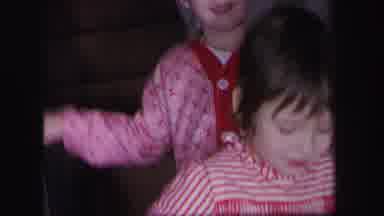 Lynbrook New York (1971): Three Kids Playing With Each Other In Their Pajamas