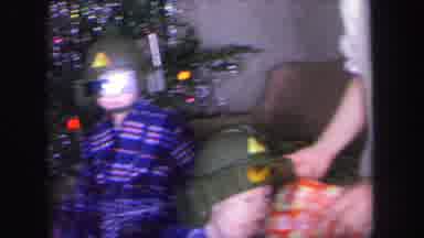 Lynbrook New York (1971): Boys Playing With Christmas Morning Toys While Mom