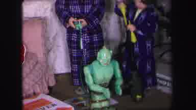 Lynbrook New York-1971: Two Boys Play With Toys In Pajamas On Christmas Morning