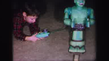 Lynbrook New York (1971): Little Boy Playing With Remote Operated Green Robotic
