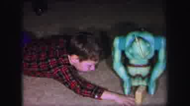 Lynbrook New York-1971: A Child Playing With A Remote-Controlled Robot Toy