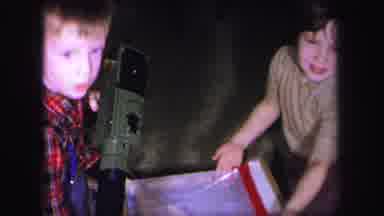 Lynbrook New York (1971): Two Children Are Playing With A Toy Gun And A Man Made