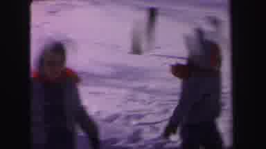 Lynbrook New York (1971): Kids Wearing Blue Coats Play In Snow On A Sunny Day