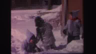 Lynbrook New York (1971): Children In Snow Gear Cleary Having Fun Roughhousing In