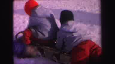 Lynbrook New York (1971): Two Little Boys Trying To Get On A Sled In The Snow