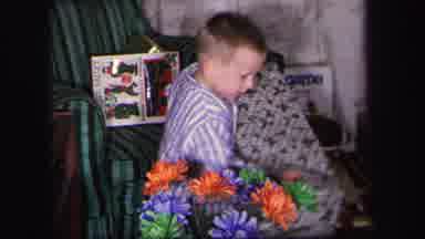 Lynbrook New York (1971): A Child Takes The Gift And Open To See Him