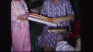 Lynbrook New York (1971): People Opening Up Christmas Presents