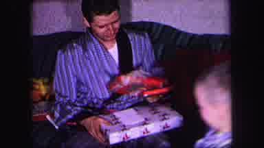 Lynbrook New York (1971): Daddy Receiving Gifts From Child At Christmas Time And