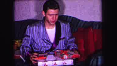 Lynbrook New York (1971): Family Opening Christmas Presents In Living Room Playing