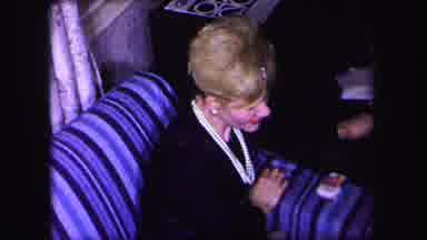Lynbrook New York (1971): Blonde Lady Smiling Smoking While Sitting On A Blue