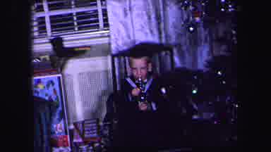 Lynbrook New York (1971): A Boy And Girl Play With Toys Next To A Christmas Tree