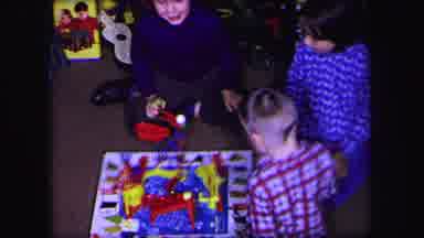 Lynbrook New York (1971): Three Children Sitting On A Carpeted Floor Playing The