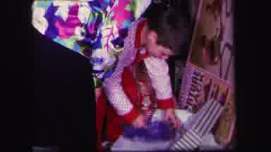 Lynbrook New York (1971): The Boy Opens The Gift Box And Picks Up The Gift In It