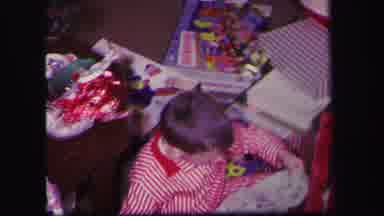 Lynbrook New York (1971): Christmas With Family Boy Opening Gifts In Pajamas