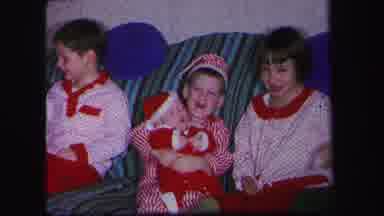 Lynbrook New York (1971): Three Children And A Baby Sit On Couch Wearing Christmas