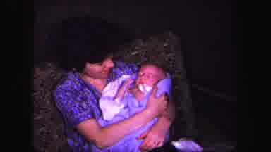 Lynbrook New York (1971): A Mother Holding Her Newborn While Her Older Sons Sit