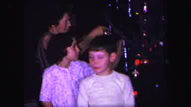Lynbrook New York (1971): Children And An Adult Hanging Tinsel And Decorating A