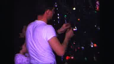 Lynbrook New York (1971): Father And Son Decorate Christmas Tree Together With
