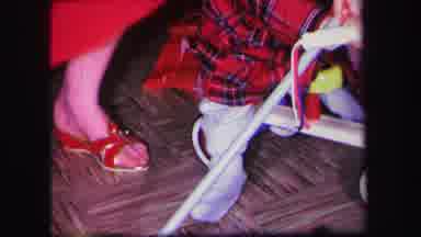 Lynbrook New York (1971): Woman Introducing Toddler In Bathrobe To Tri-Cycle While