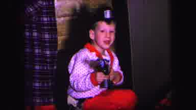Lynbrook New York (1971): Kids In Pajamas Point Toy Rifles At Camera Man Before