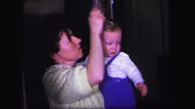 Lynbrook New York (1971): Little Boy Gets Hair Combed After Getting Dressed Up By
