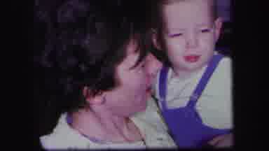 Lynbrook New York (1971): A Mother Holding Her Baby And Giving Him A Sweet Kiss