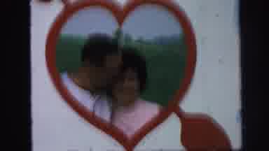Lynbrook New York (1971): Loving Couple Sneaking A Kiss In The Heart Of A Vintage
