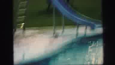 Lynbrook New York (1971): The Person Is Using Sliding Bar And Swim The Swimming